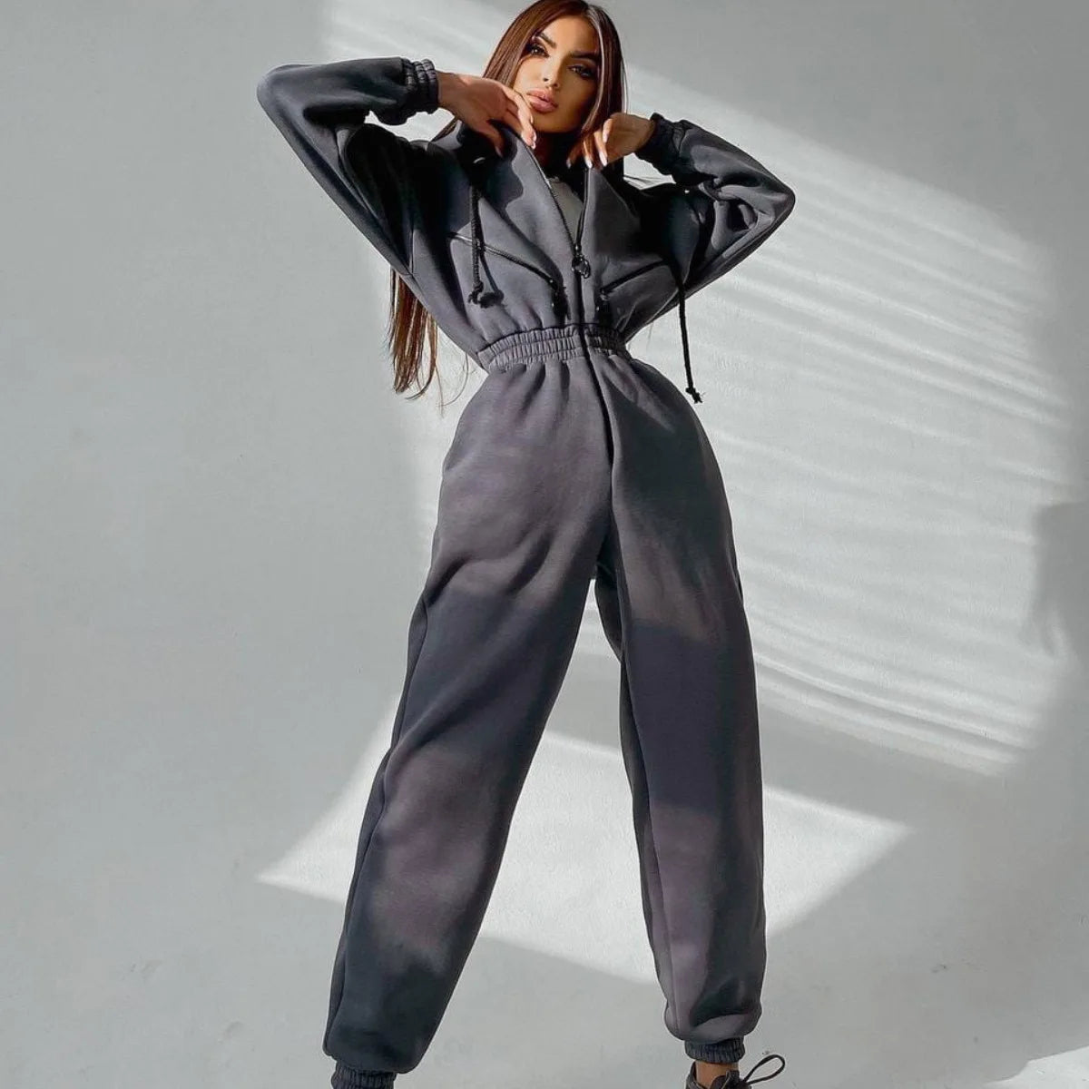 Heather gray heavyweight fleece zip-up jumpsuit with cinched waist and adjustable hood