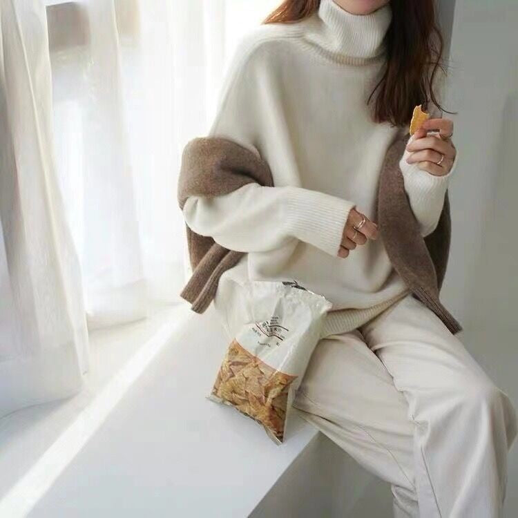 Relaxed-fit cashmere turtleneck sweater in neutral tone, breathable knit pullover for everyday luxury