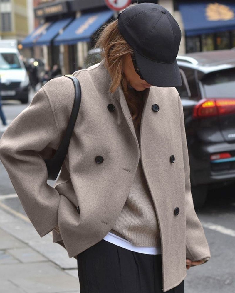Oversized double-breasted women's cropped jacket, relaxed structured fit with minimalist silhouette