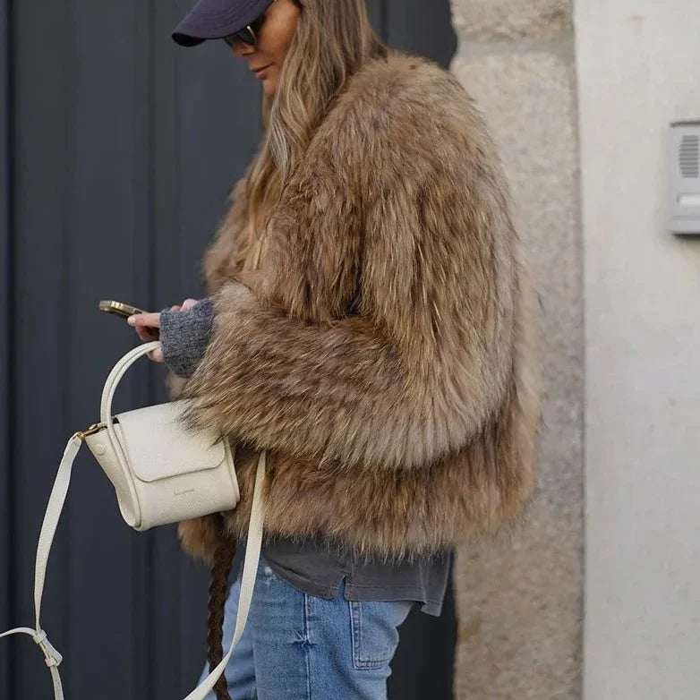 Women's oversized coat with faux fur trim, relaxed chic silhouette for autumn winter layering
