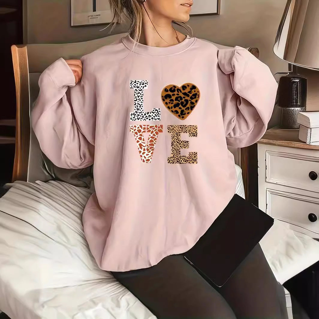 Women's leopard print crew neck knit sweater, chic everyday style with classic layerable silhouette