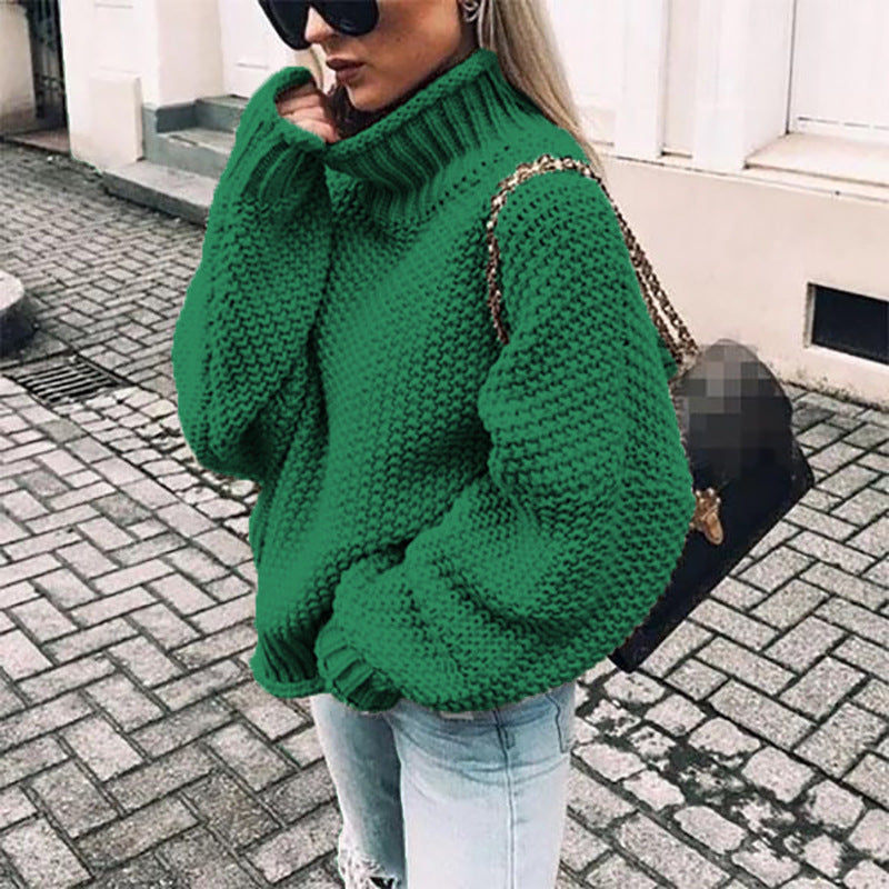 Women's chunky knit turtleneck sweater in neutral tone, oversized relaxed fit with thick textured knit