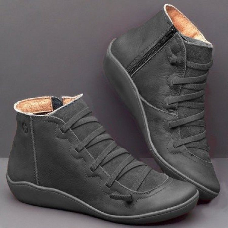 Women's black lace-up zip ankle boots with sleek side zipper closure and customizable fit