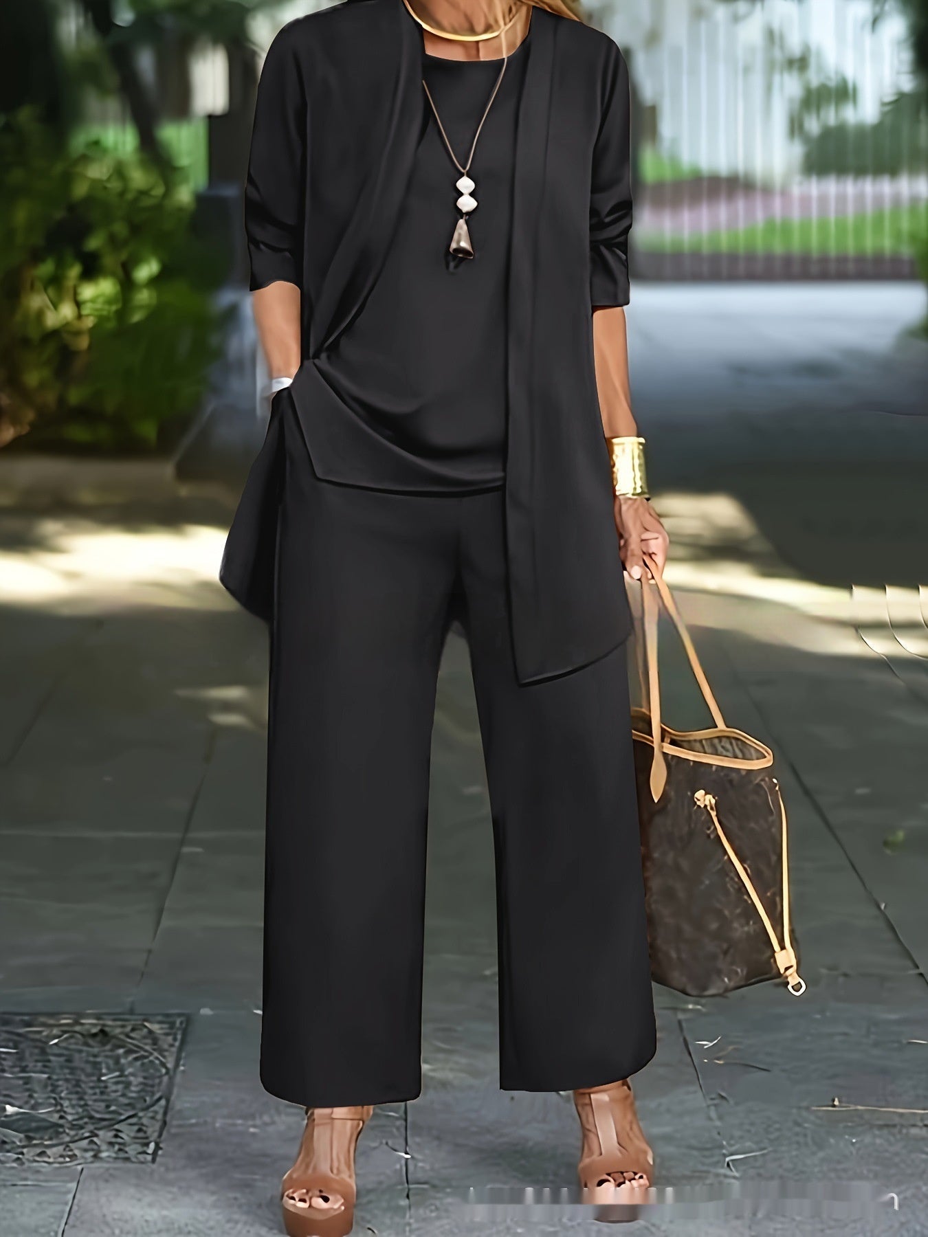Women's elegant white sleeveless top, long jacket & wide-leg pantsuit set with round neckline