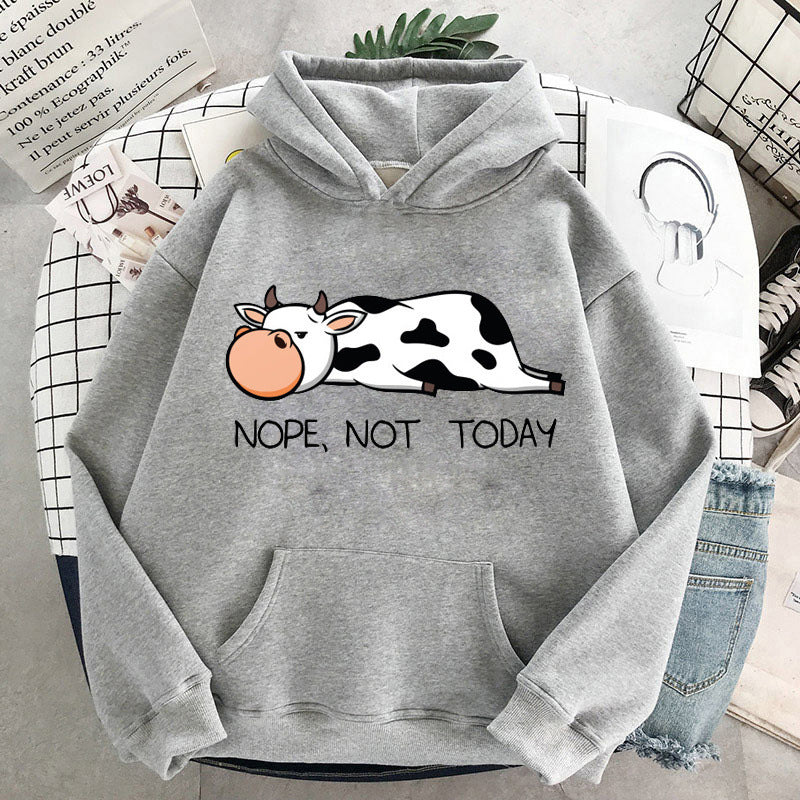 Women's relaxed fit hoodie with funny sleeping cow print and "Nope Not Today" graphic, cozy casual style