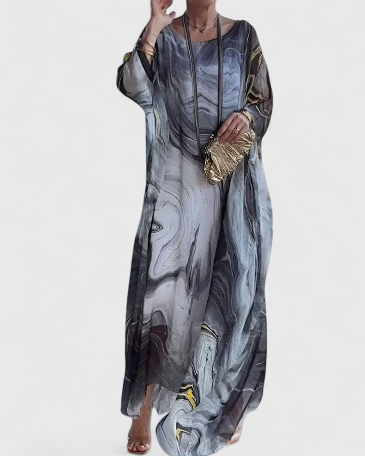 Women's loose fit artistic maxi dress with flowing silhouette and expressive patterned detailing