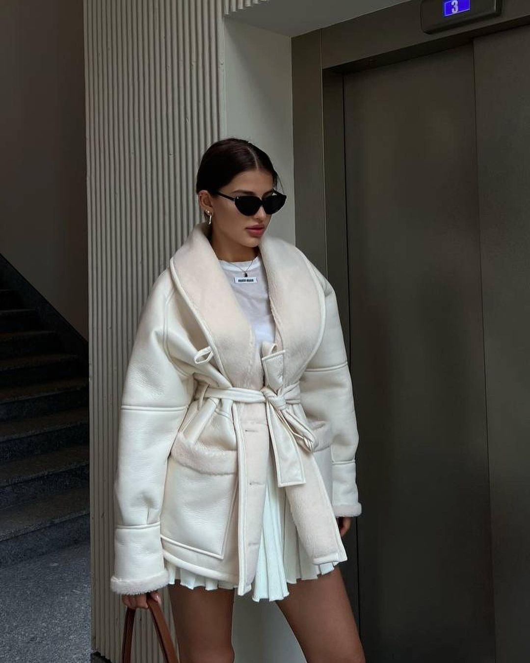 Women's Korean-style mid-length faux leather faux fur coat, loose fit, long sleeves with pockets