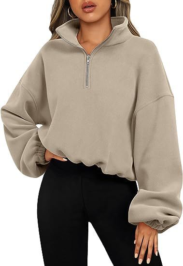 Women's relaxed fit half-zip sweatshirt with stand-up collar for sporty street style comfort