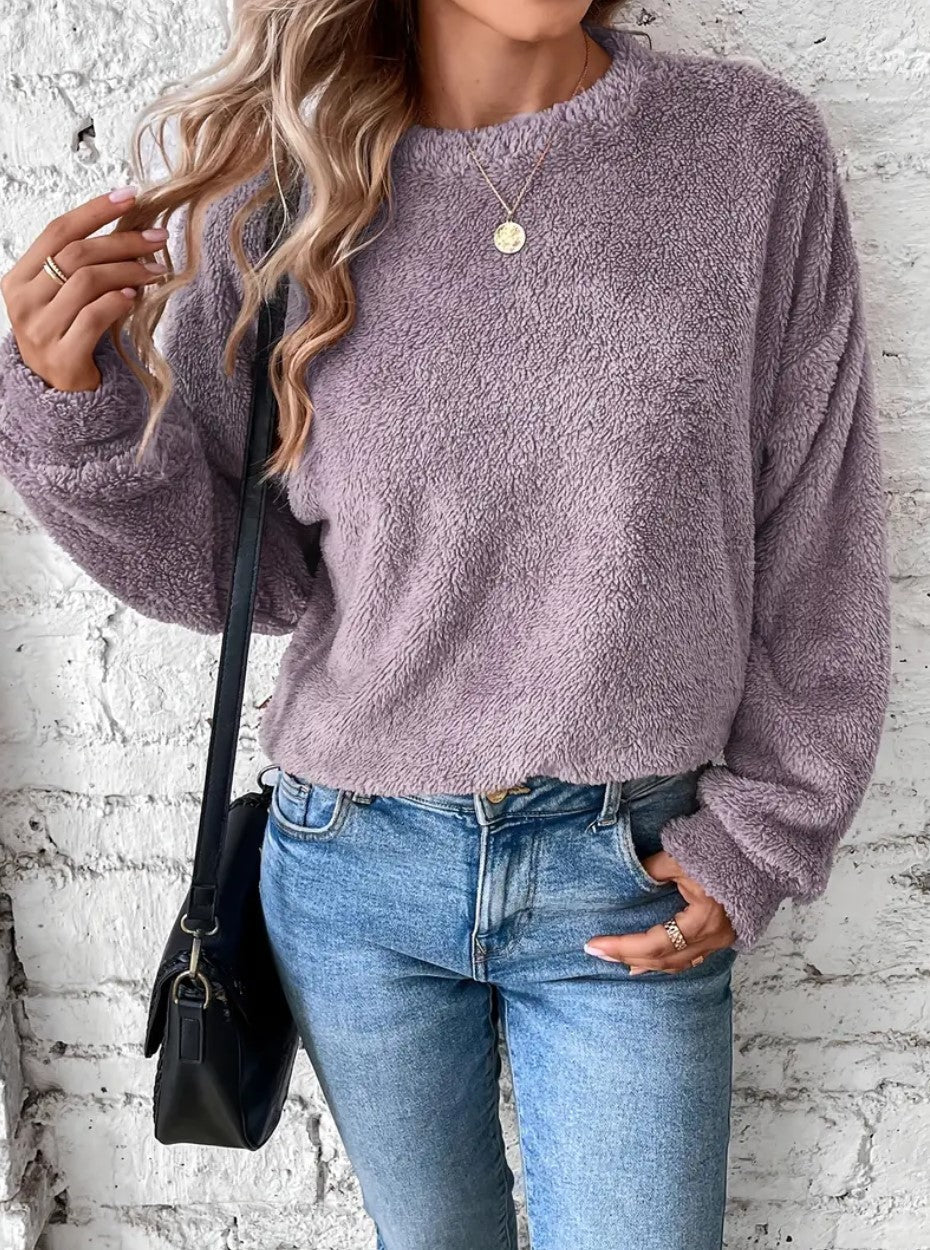 Women's ultra-soft teddy fleece sweatshirt in cozy modern fit, warm plush fabric for cold days