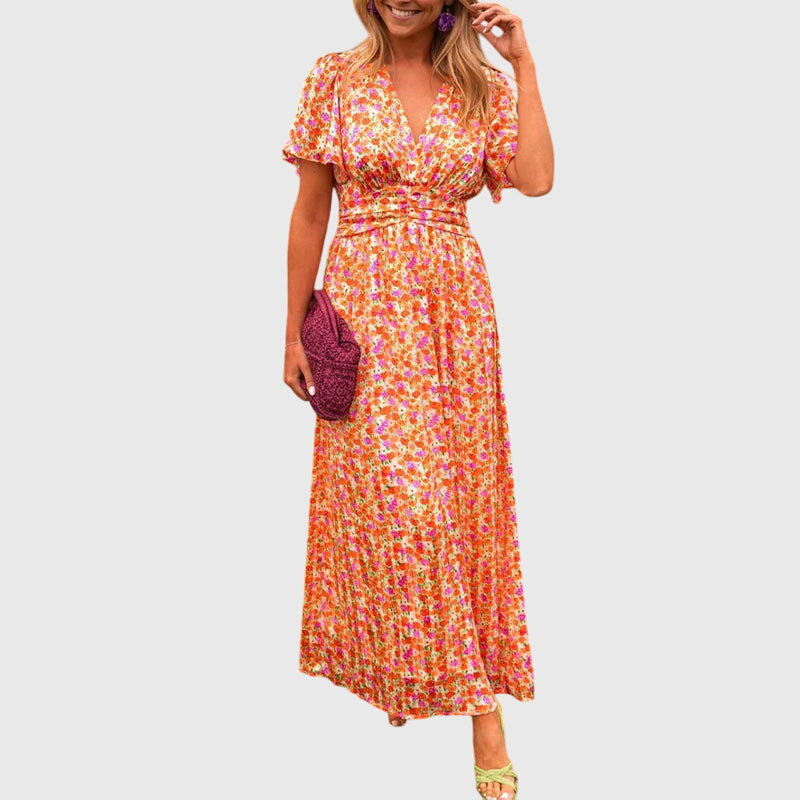 Women's flowing short sleeve summer dress in a relaxed breezy silhouette with airy drape