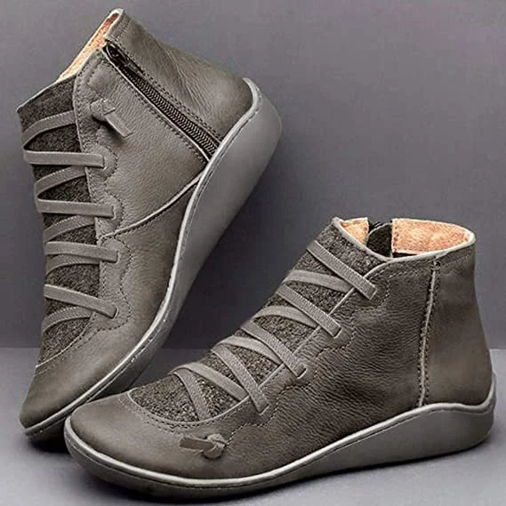 Women's black lace-up zip ankle boots with sleek silhouette and dual closure for effortless style