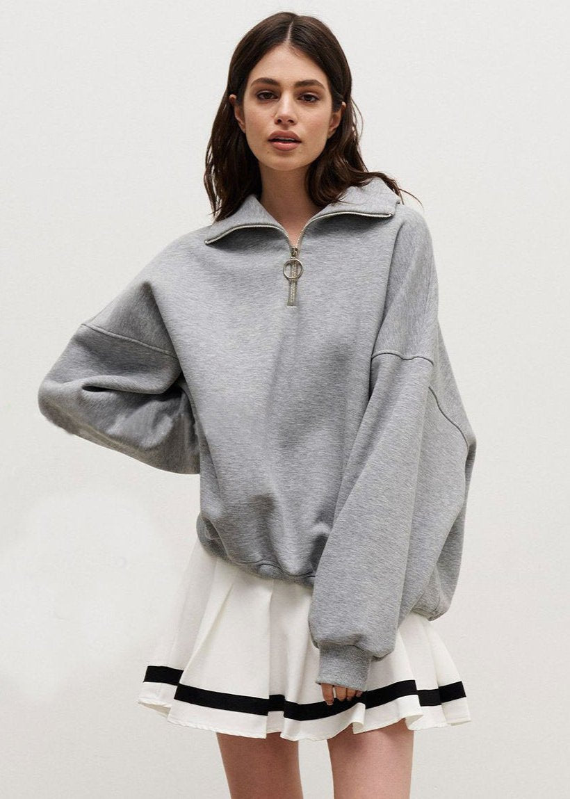 Relaxed fit half-zip pullover sweater with ring pull, dropped shoulders, soft athleisure style