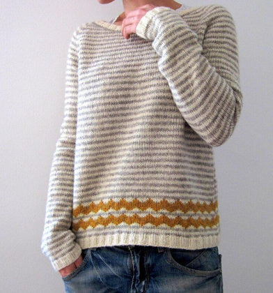 Women's multicolored ethnic knit sweater with relaxed silhouette and vibrant Elina winter pattern