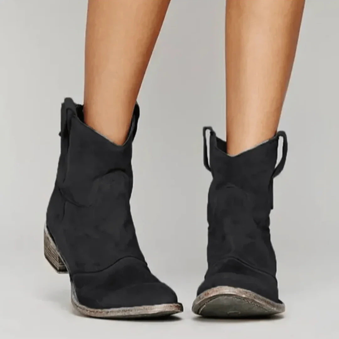 Women's brown suede western curve boots with sculpted low heel and city-ready silhouette