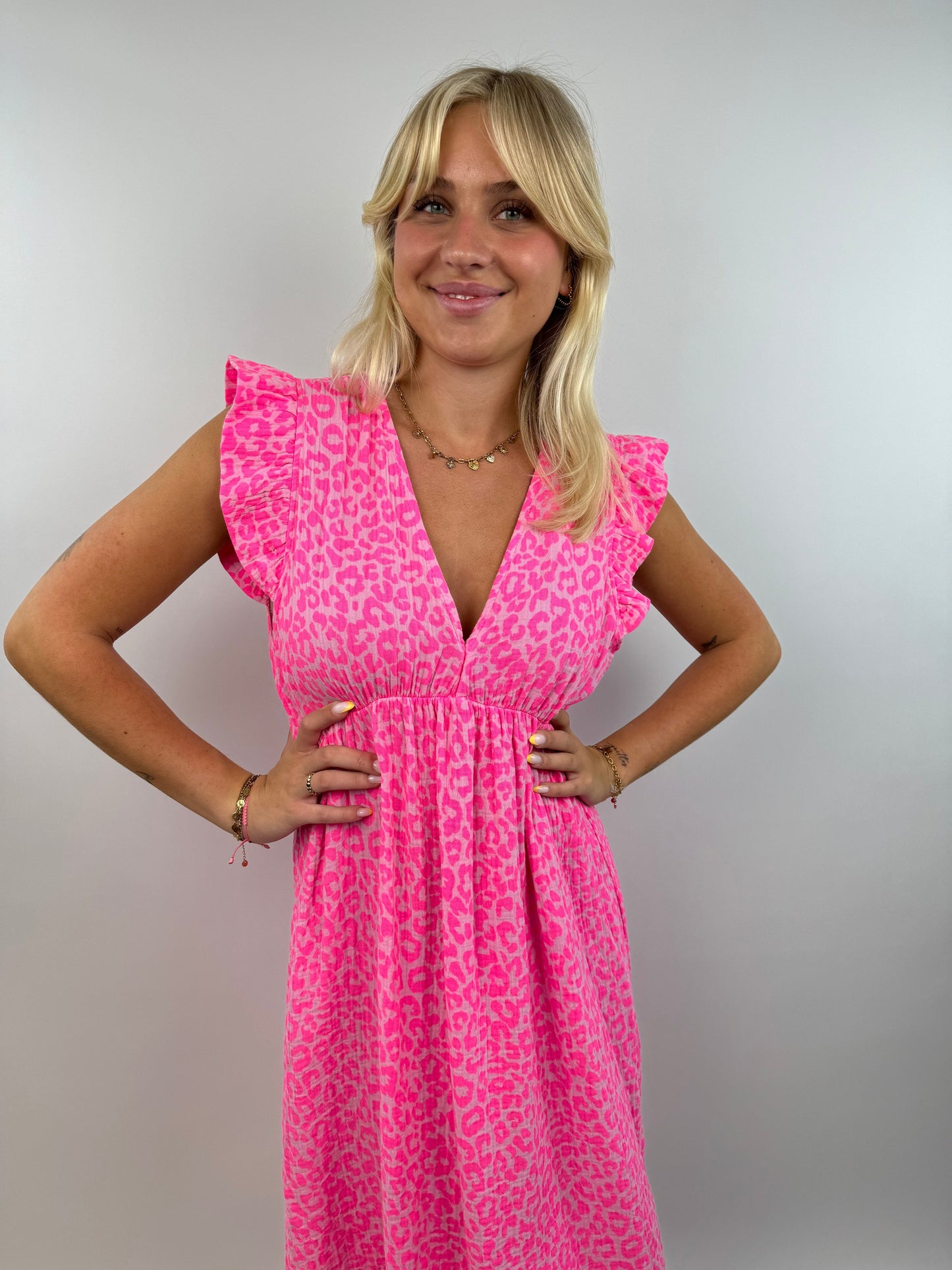 Women's neon muslin dress flowing silhouette with light ruffle sleeves bold summer style