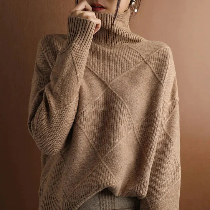 Women's wool blend oversized pullover sweater with ribbed high neck in cozy winter knit style