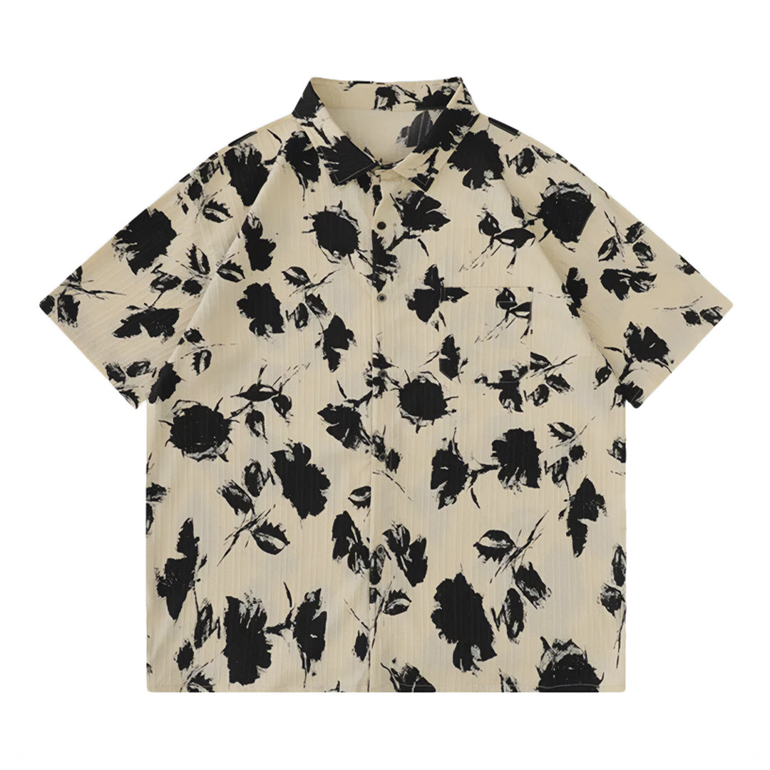 Black relaxed-fit floral shirt with textured polyester fabric and hand-painted botanical print