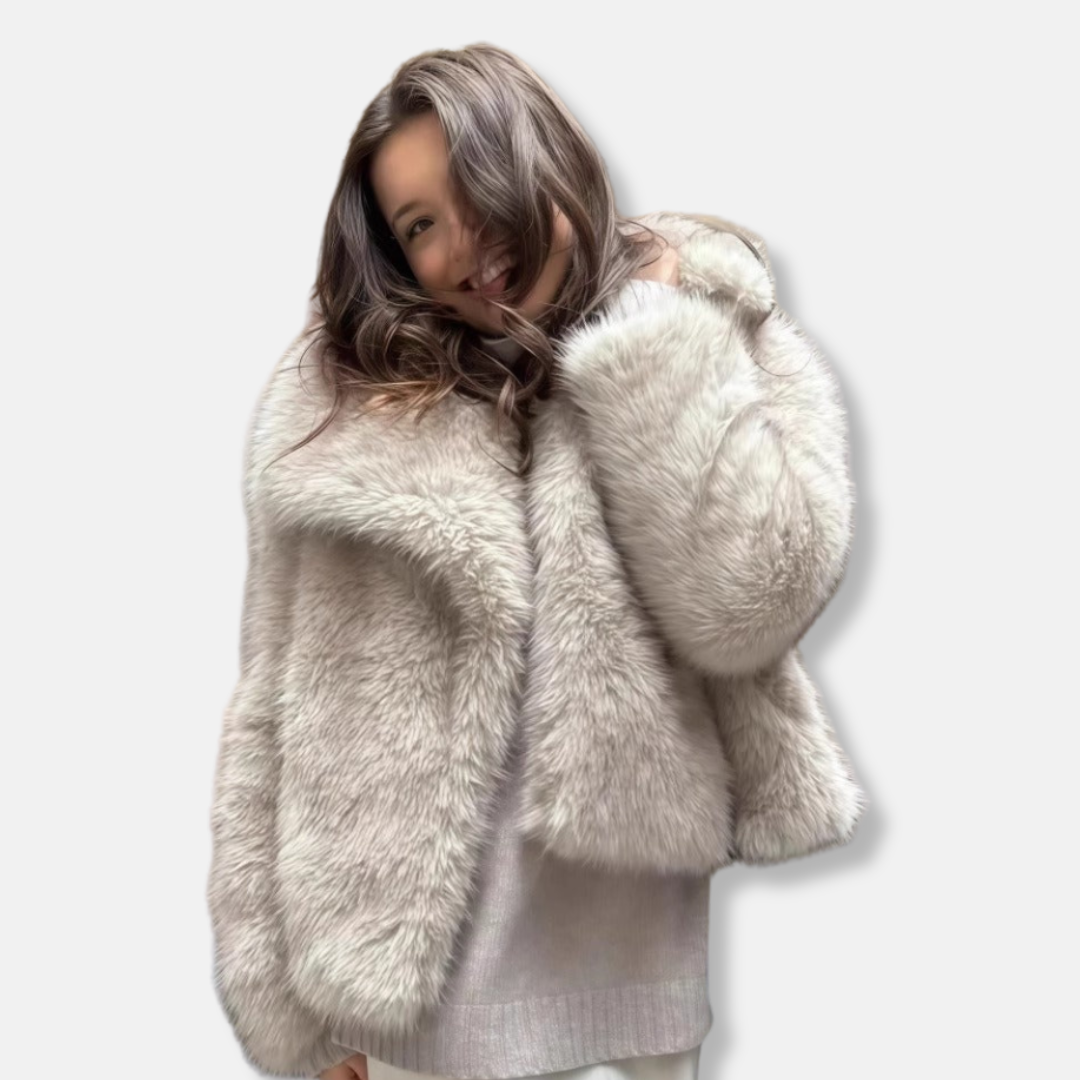 Women's oversized white faux fur coat with large collar and button front closure