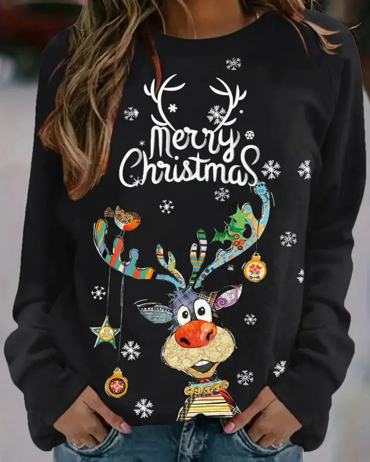 Red cozy Christmas knit sweater with festive reindeer motif, perfect for holiday winter style