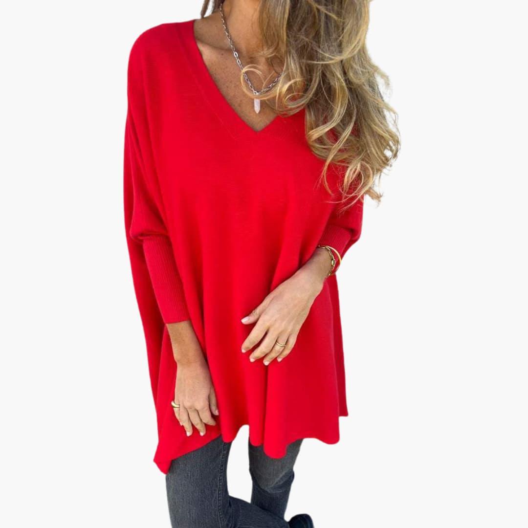 Women's loose-fit V-neck knit sweater in neutral tone, relaxed silhouette with flattering neckline