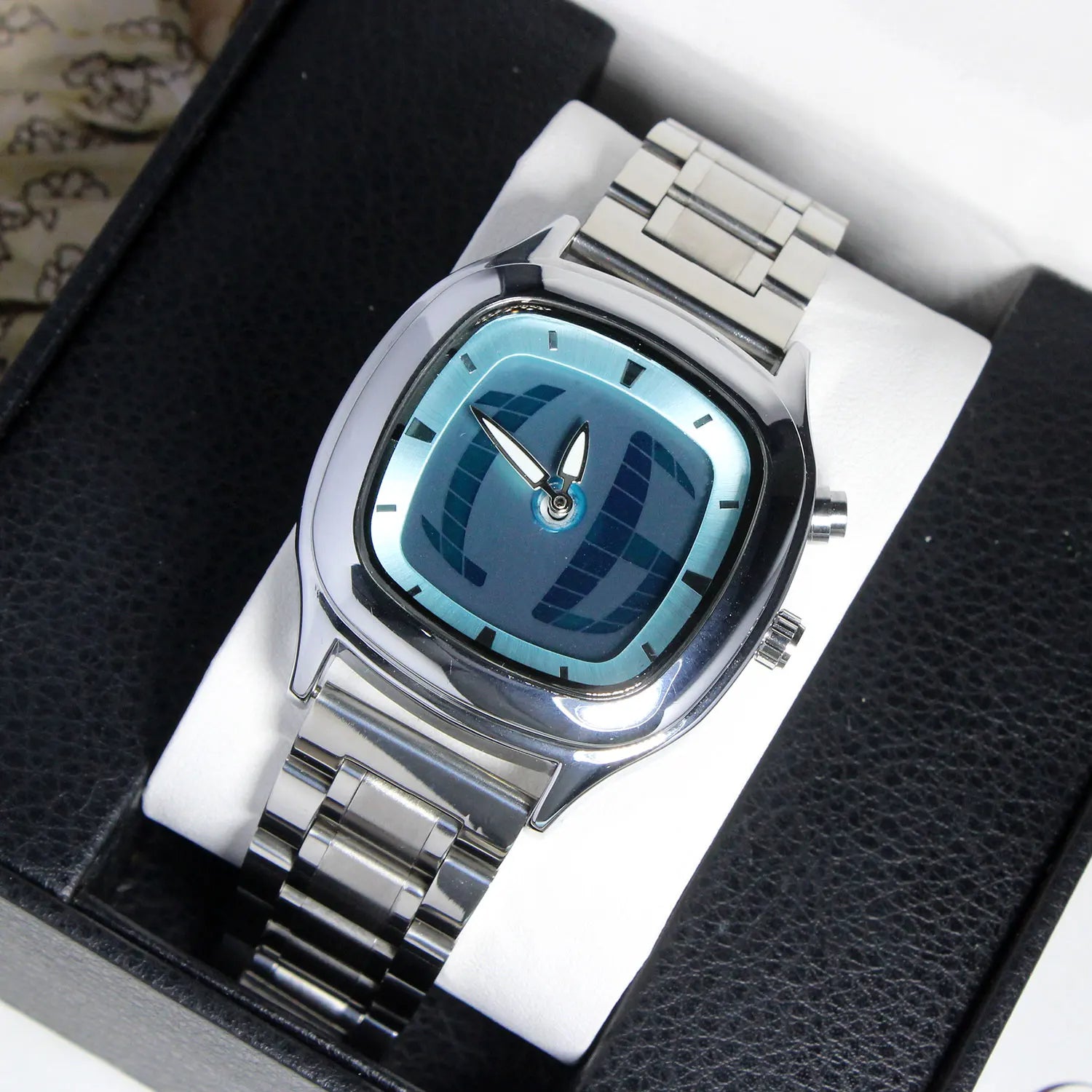 Millennium Quadrant square-curved stainless steel watch with light-reactive dial and floating hour markers
