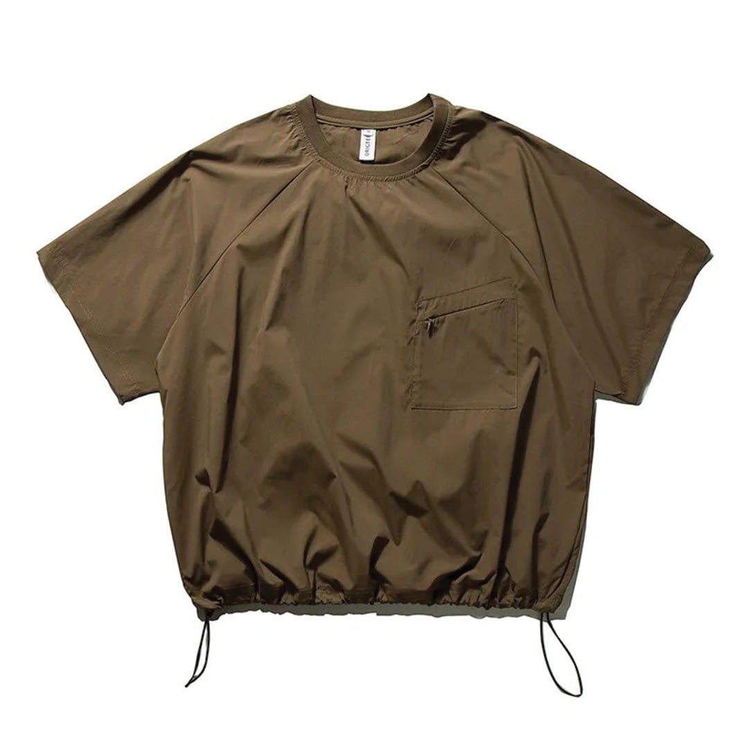Black tech nylon relaxed-fit shell tee with diagonal pocket and adjustable drawstring hem