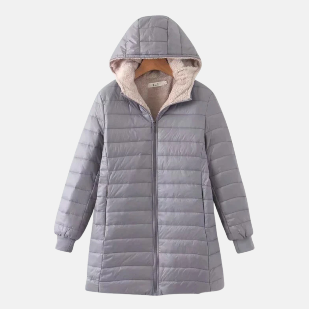 Women's mid-length quilted coat hooded insulated fleece-lined with ribbed cuffs for everyday cold-weather wear