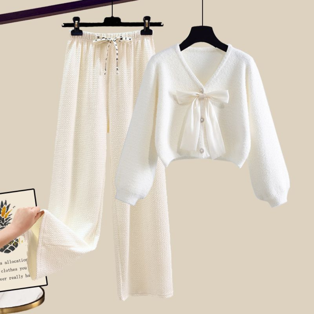 Women's plush knit cropped cardigan pants set in neutral tones with sheer bow detail