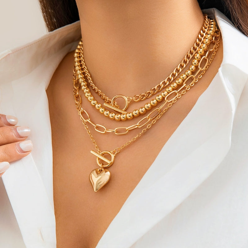 Solane layered necklace mixed chains and pearls toggle front statement jewelry for women