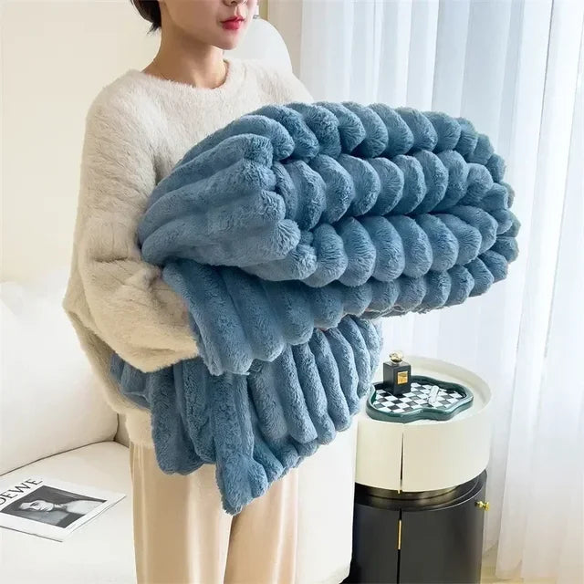 Quilted plush throw blanket ultra-cozy soft padding ideal for cold nights warmth and comfort
