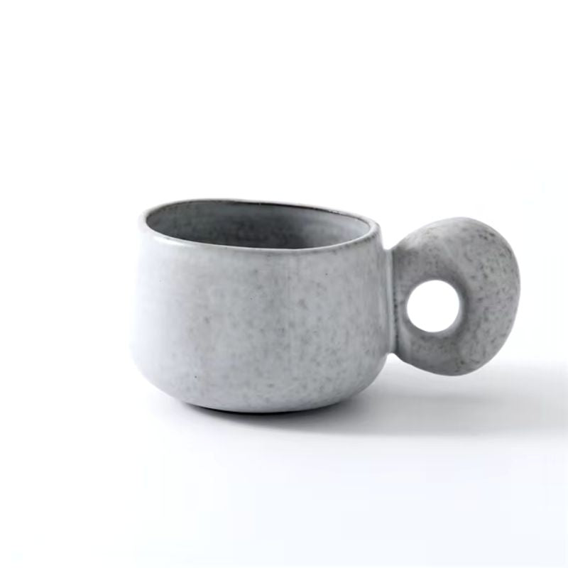 Terra handcrafted ceramic mug speckled glaze finish ergonomic grip rustic modern design for tea lovers