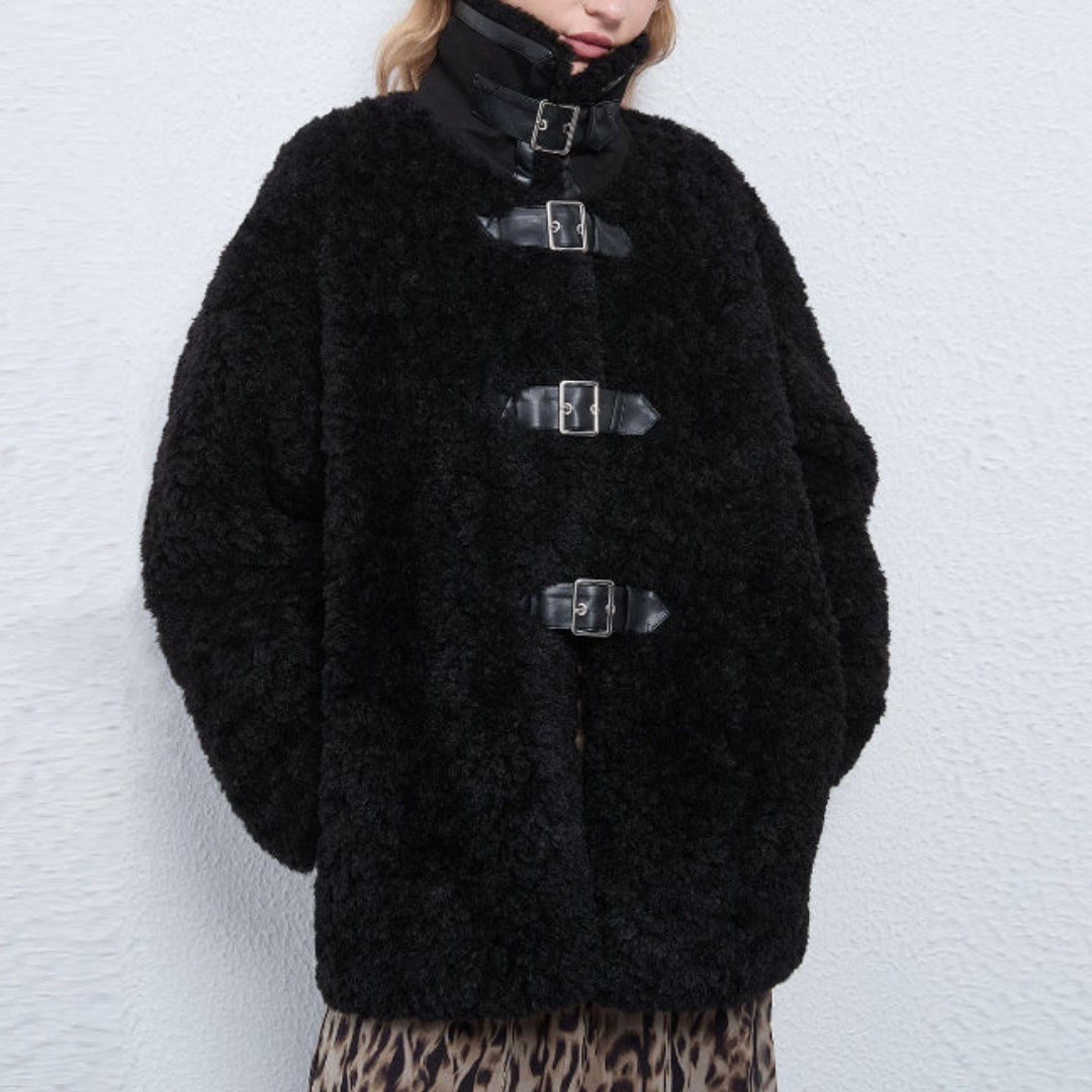 Women's oversized wool coat with buckle front closure, relaxed silhouette for cozy cold weather style