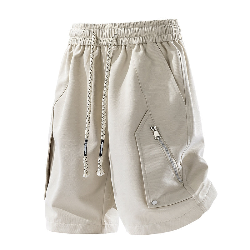 Unisex athletic shorts in breathable performance fabric with elastic waist and secure zip pockets