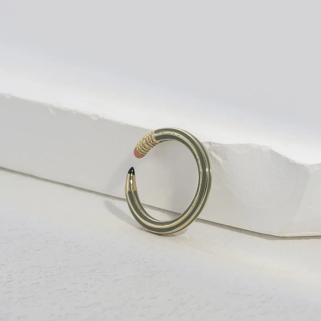 Rose gold adjustable copper pencil-shaped statement ring with pencil silhouette design for artists
