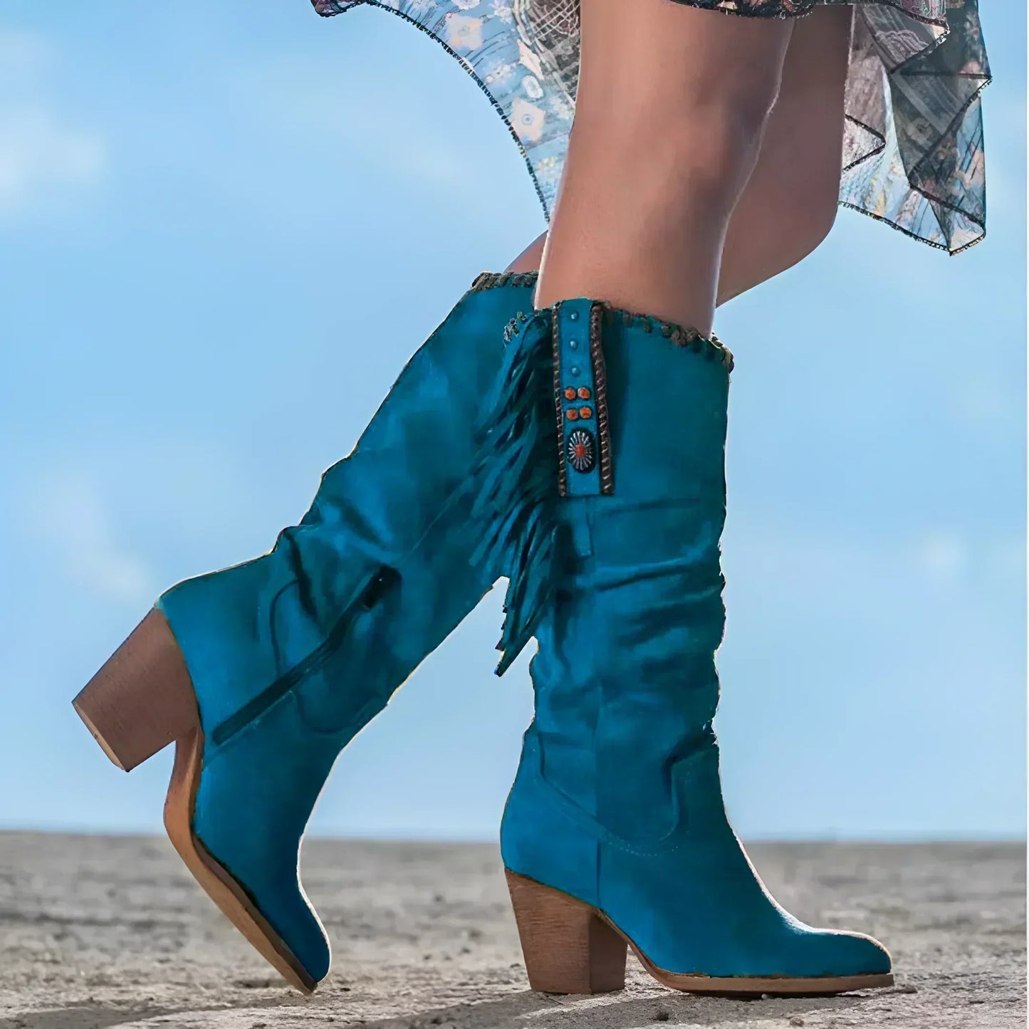 Women's brown suede fringe cowboy boots with bold boho western fringe detail for free-spirited style
