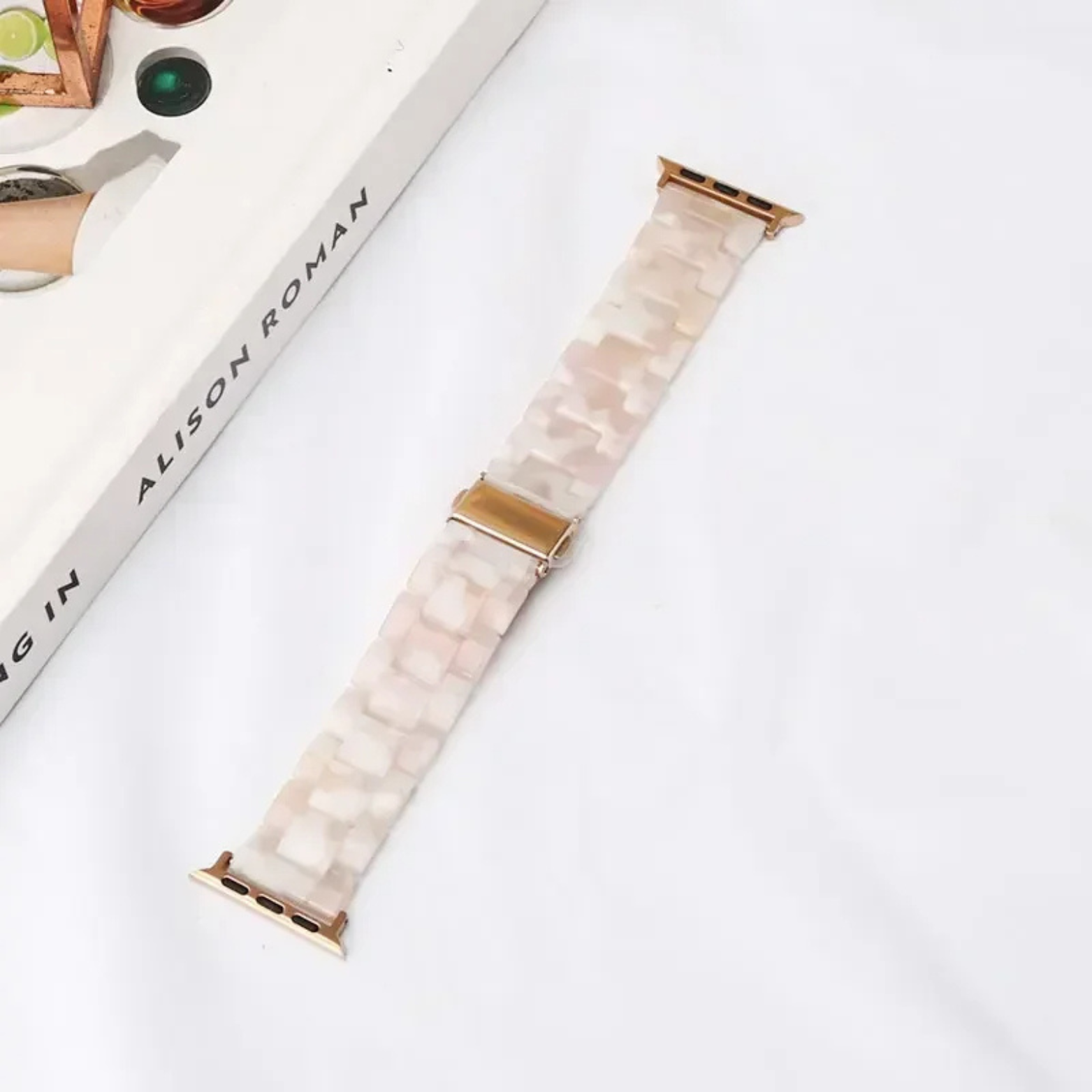Bold marbled resin Apple Watch band with luminous high-gloss finish and scratch-resistant adjustable links