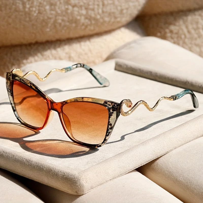 Oversized cat-eye sunglasses with sculpted snake arms, electric acetate finish, UV400 bold fashion eyewear