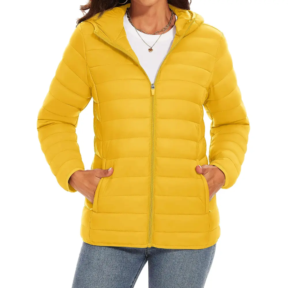 Women's quilted puffer jacket in warm tones, hooded insulated winter coat with structured padding