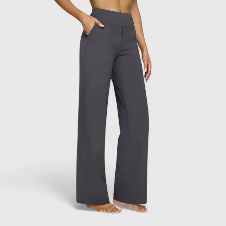 Women's high waist wide leg pants in neutral tone, flowing silhouette for effortless chic professional style
