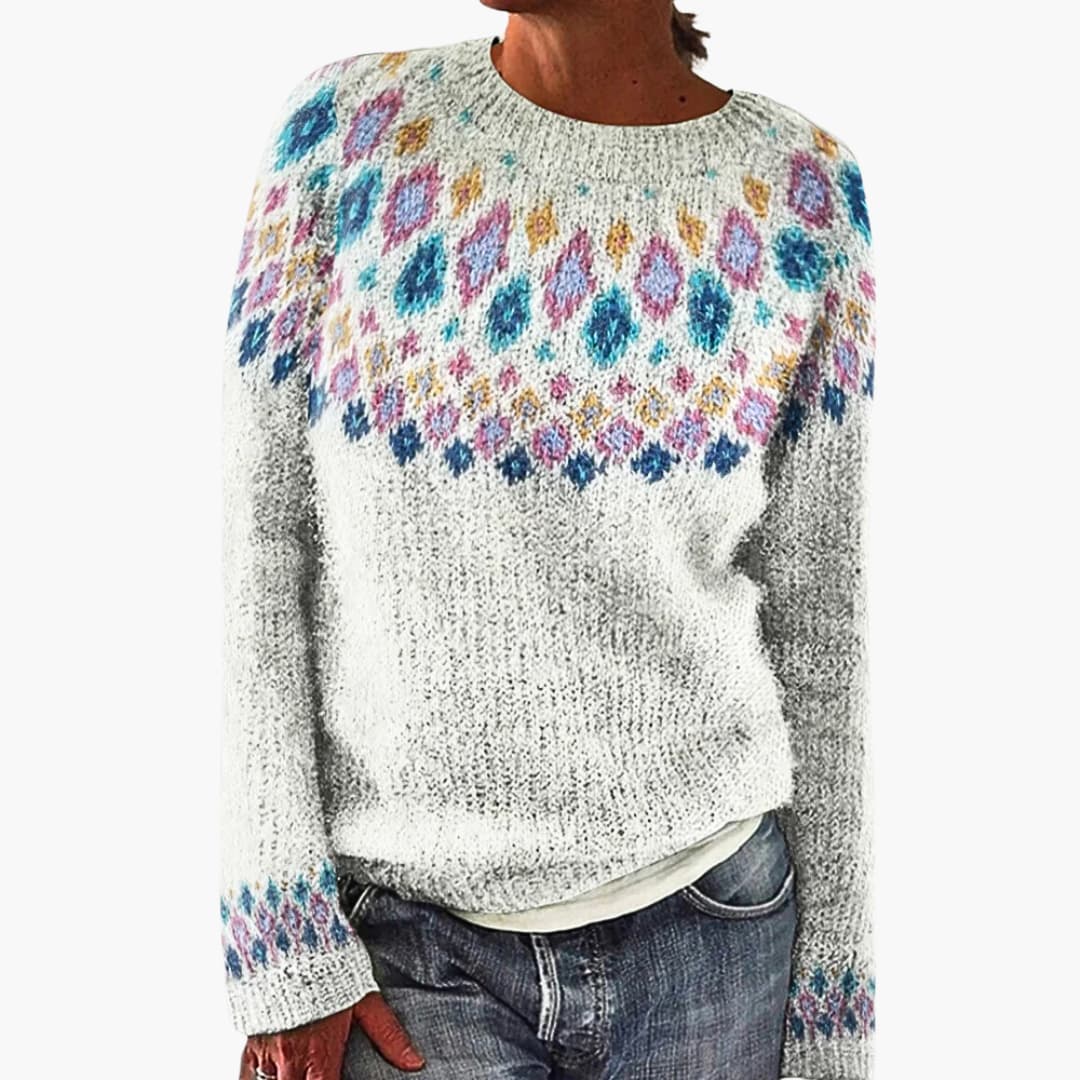 Women's loose knit sweater in neutral tones, relaxed cut with distinctive textured knit pattern for cold days