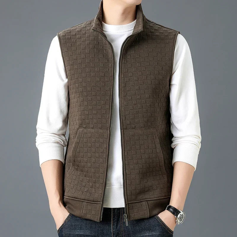 Checkered knit vest with fleece lining, breathable cotton blend, classic pattern for everyday layering