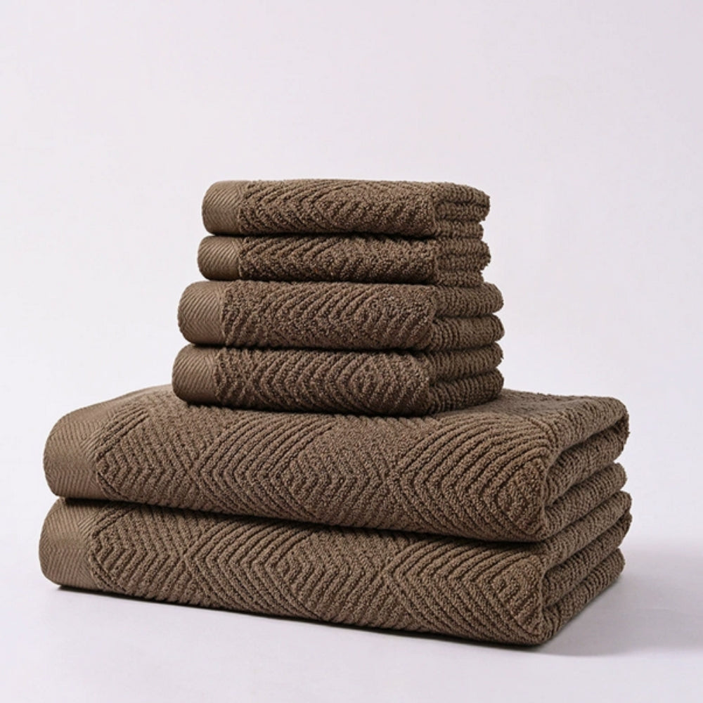Soft white chevron-pattern cotton bath towel set, minimalist spa-style ultra-absorbent textured weave