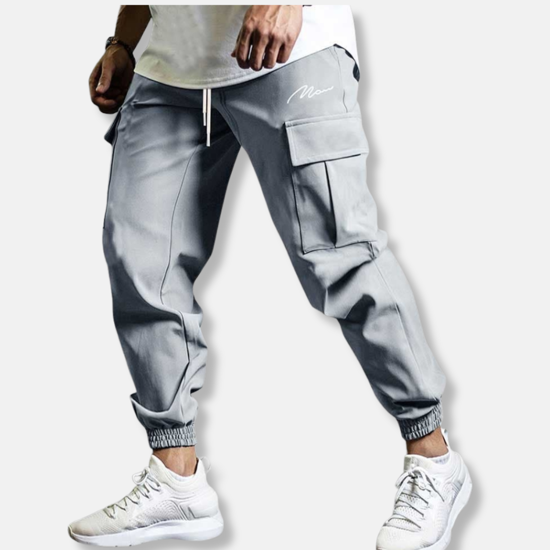 Men's relaxed fit cargo jogger pants with elastic waist, side pockets, and ankle-length silhouette