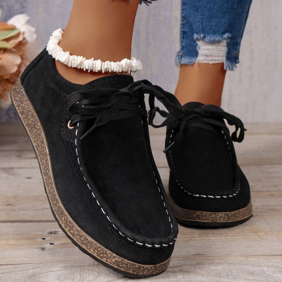 Women's lace-up sneakers in neutral tones, breathable mesh upper with cushioned sole for active comfort