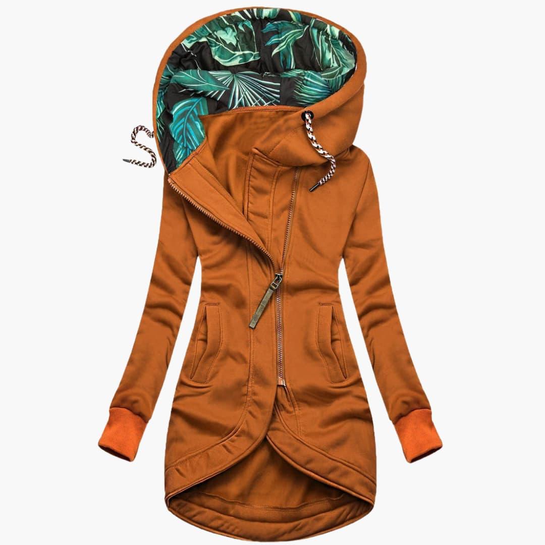 Women's quilted winter jacket with fixed hood, raised neckline, and large front pockets for cozy warmth