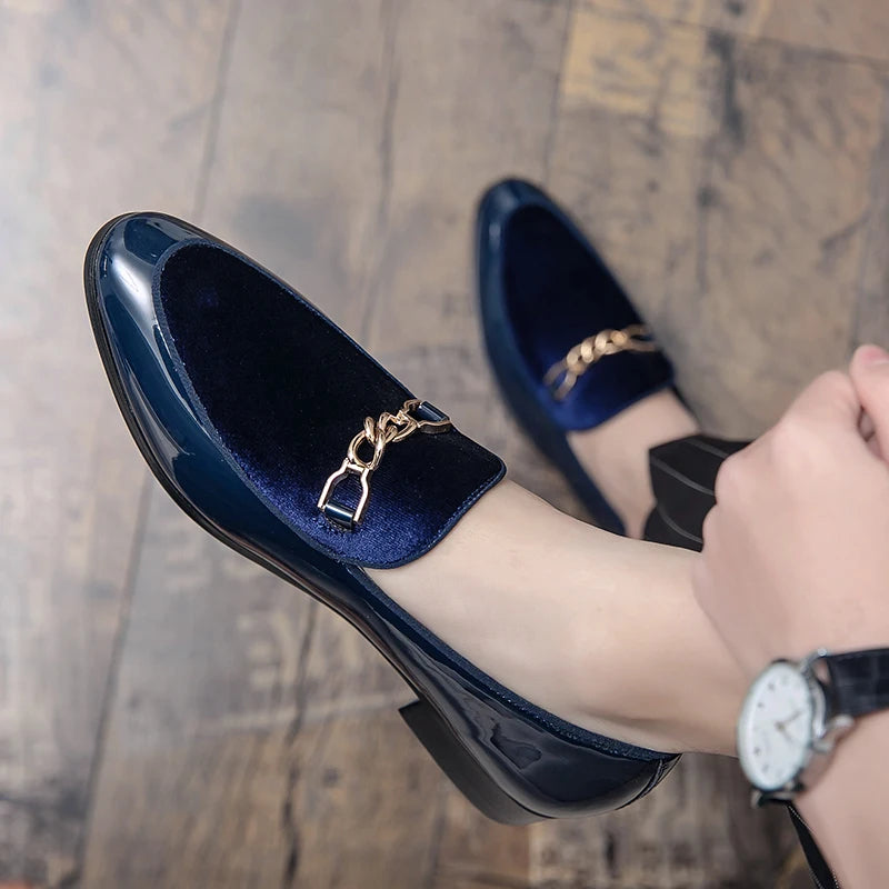 Burgundy velvet loafers with gold chain accent and glossy patent leather trim for polished style