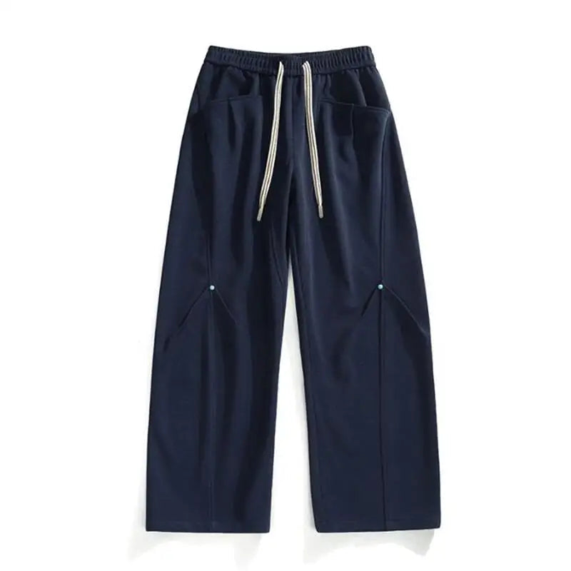 Black panel cut sweatpants exaggerated wide-leg silhouette with striped drawstrings streetwear