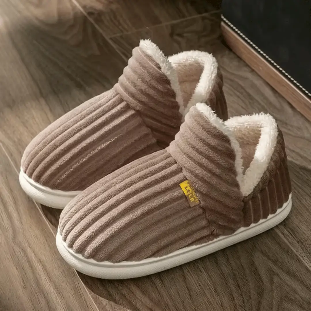 Unisex sherpa fleece slippers with plush lining and non-slip rubber sole for indoor comfort