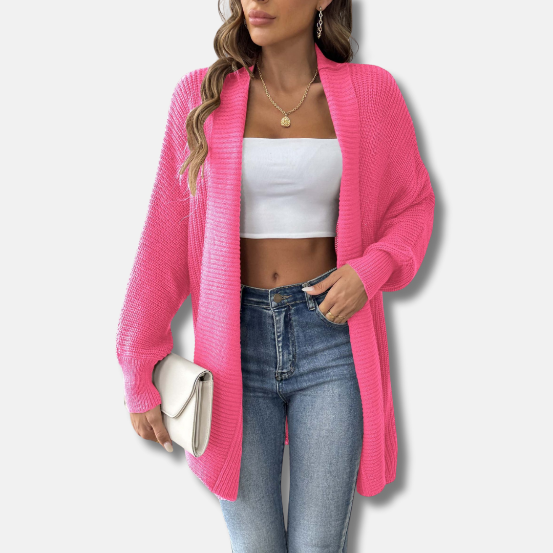 Women's longline acrylic knit cardigan with shawl collar and pearl button detailing