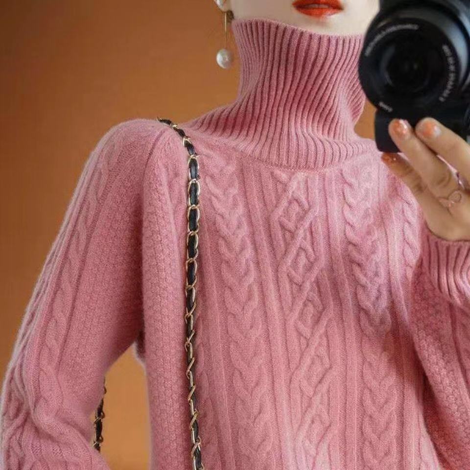 Women's loose-fit turtleneck sweater in premium soft knit with elegant relaxed silhouette